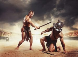 Roman gladiators fighters fighting with sword at coliseum arena. Gladiator won