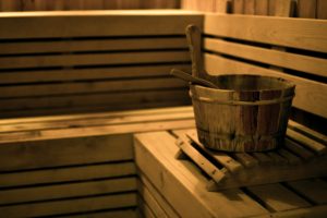 Sauna bucket in wooden sauna room